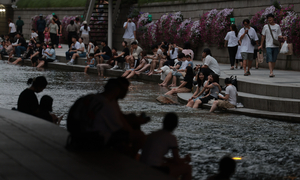 Heat wave grips S. Korea as monsoon ends early in south