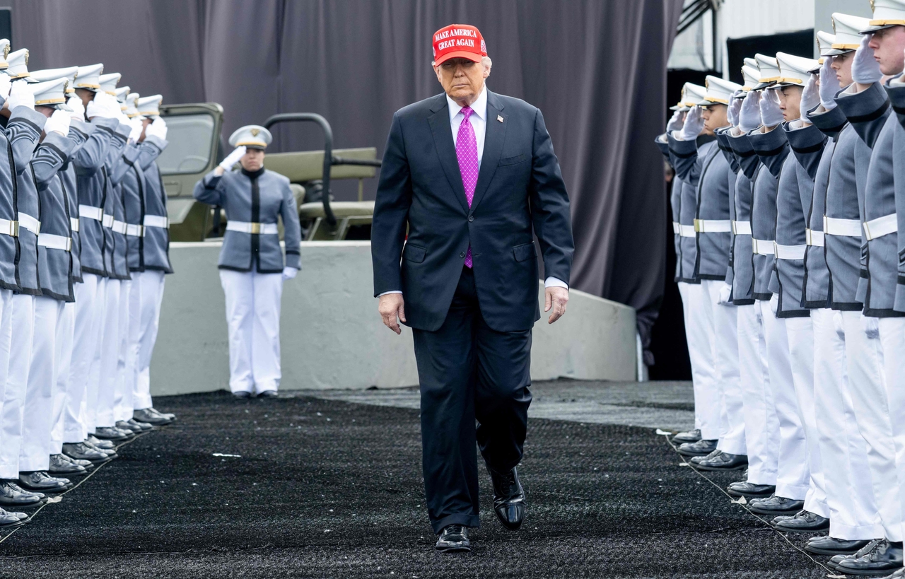 US President Donald Trump (center) arrives to deliver the commencement address at the 2025 graduation ceremony at the US Military Academy West Point, in West Point, New York, Saturday.    (AFP-Yonhap)