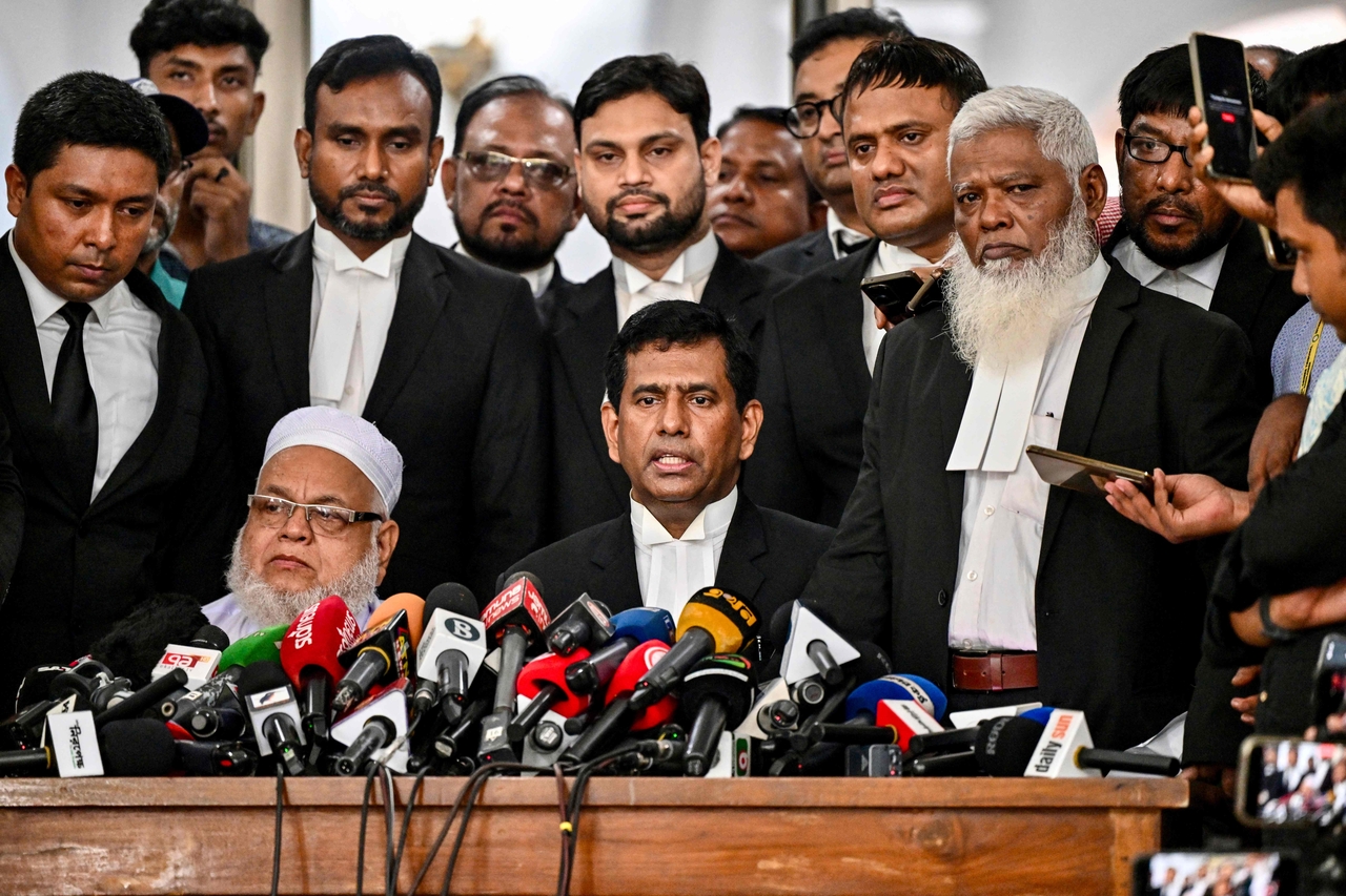 Chief prosecutor of Bangladesh's International Crimes Tribunal Mohammad Tajul Islam (center) speaks during a press conference in Dhaka, Bangladesh, Sunday. (AFP-Yonhap)
