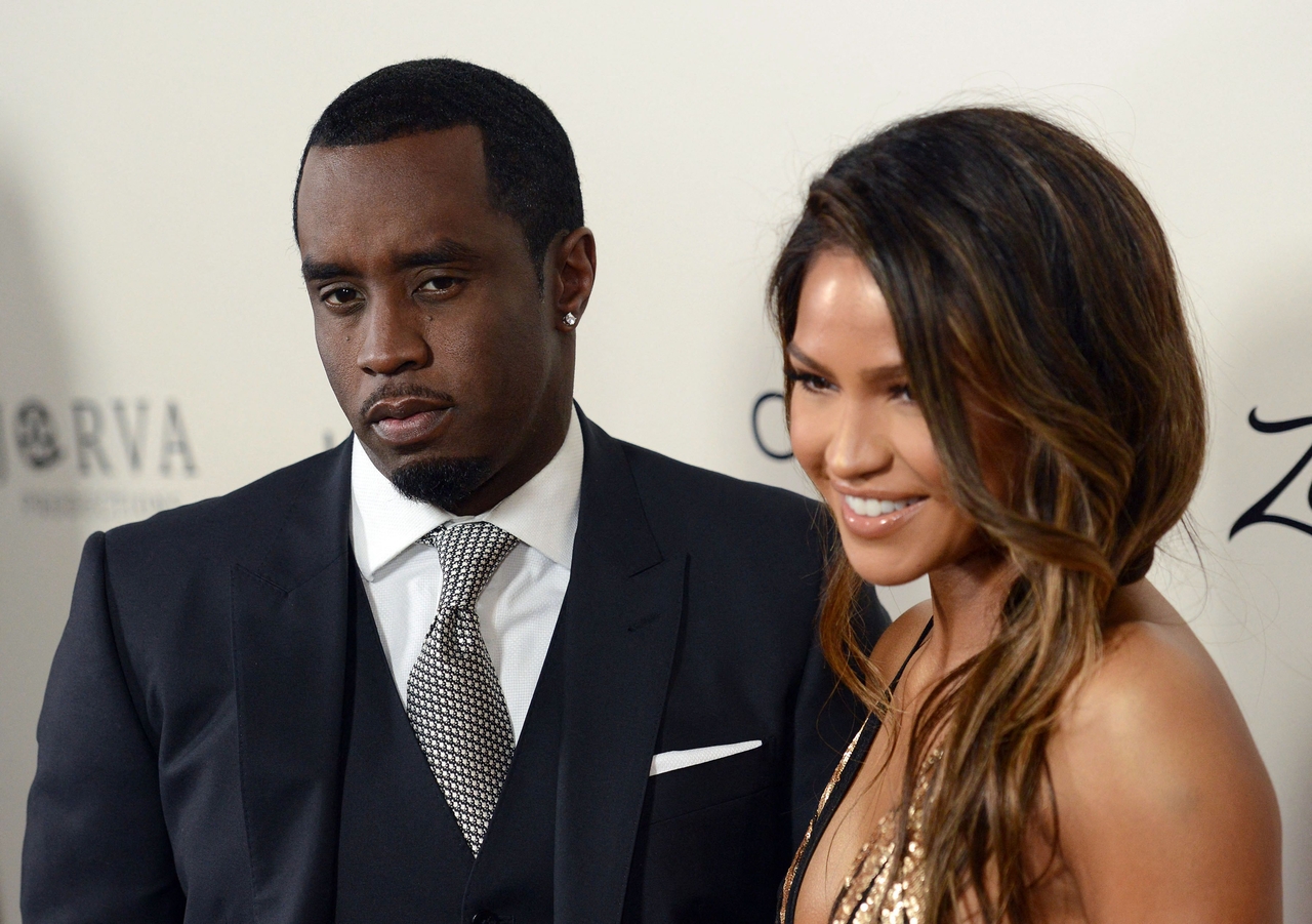 Sean "Diddy" Combs (left) with Cassie Ventura attend an event in Los Angeles, March 7, 2016.   (AFP-Yonhap)