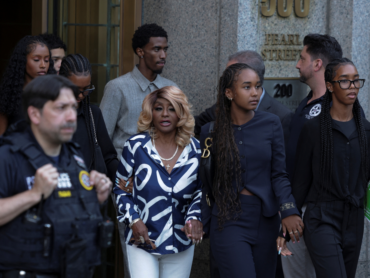 Family of Sean "Diddy" Combs walk out of the US federal court following a bail hearing, after the jury reached verdicts in the sex trafficking and racketeering conspiracy trial, in Manhattan, Wednesday. 　 (Reuters-Yonhap)