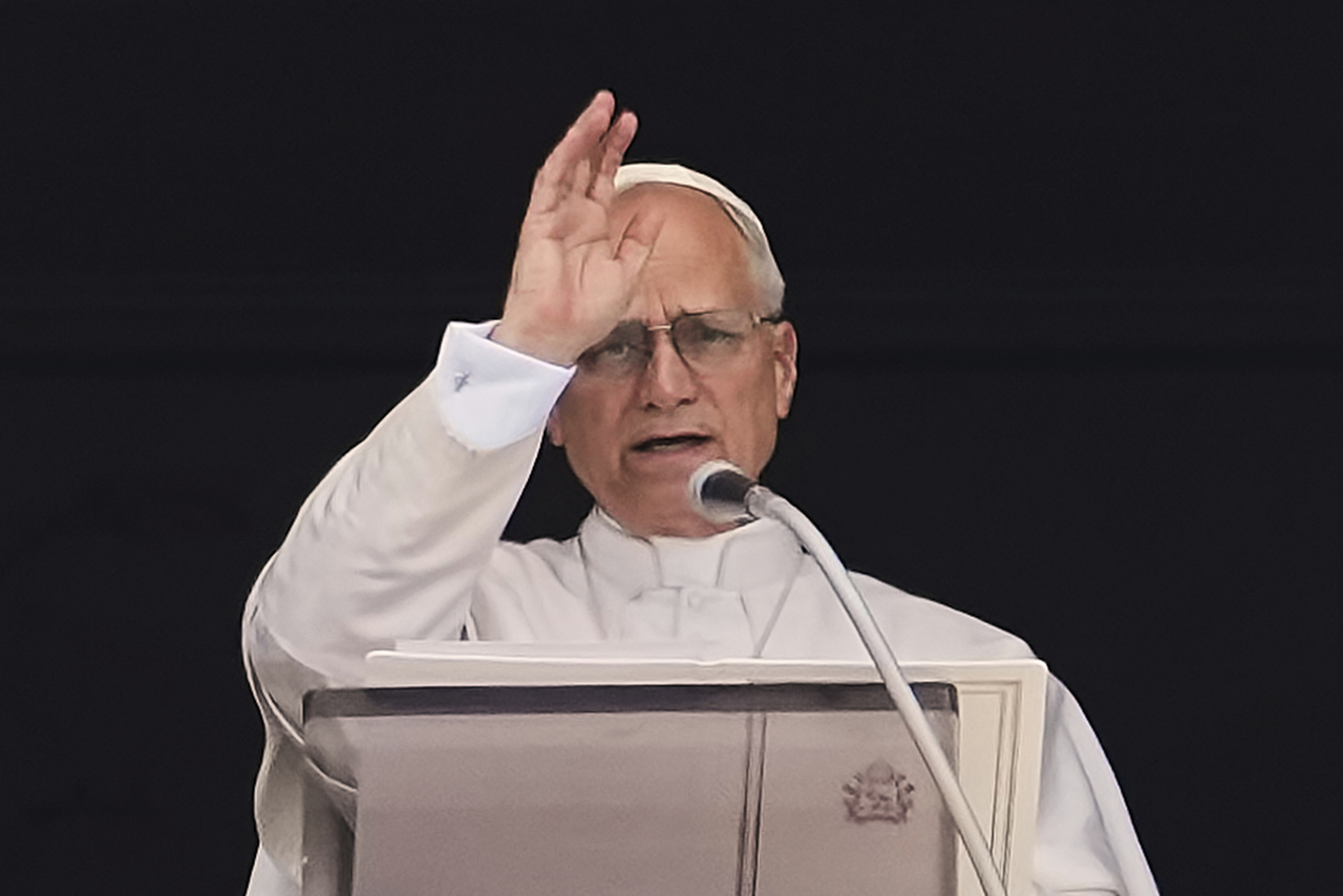 Pope Leo XIV appears at his studio's window to bless the faithful gathered in St. Peter's Square at the Vatican for the Angelus prayer, Sunday. (AP-Yonhap)