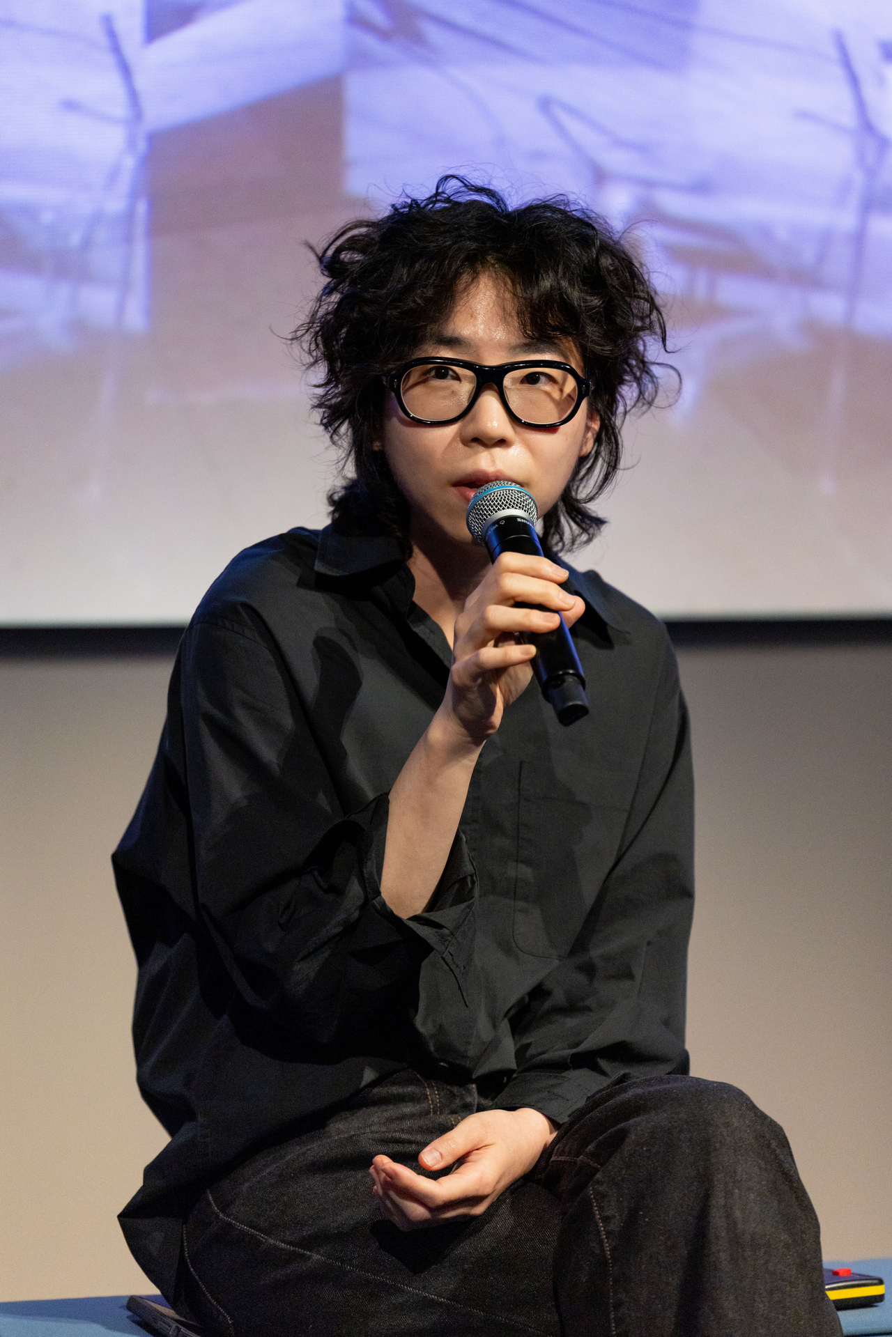 Artist Jun So-jung speaks on the panel for "Society as Medium -- Objects as Anchors: Material, Narrative and Memory," held at Manarat Al Saadiyat in Abu Dhabi, United Arab Emirates, June 14. (ADMAF)