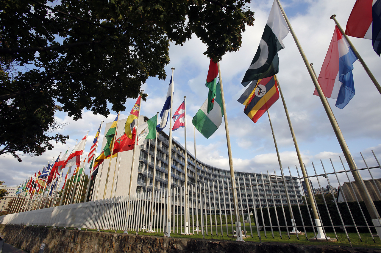 National flags from several countries fly in front of the UNESCO headquarters UNSECO  in Paris. (Getty Images)
