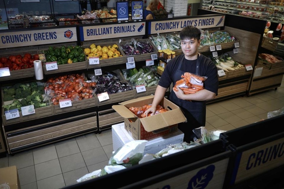 Temasek Polytechnic student Lucas Lim has worked part-time at Fairprice every weekend for one and a half years to help relieve the financial burden on his family.    (Straits Times)