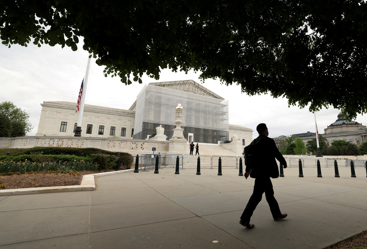 A person walks past the U.S. Supreme Court in Washington on April 21.   Reuters-Yonhap