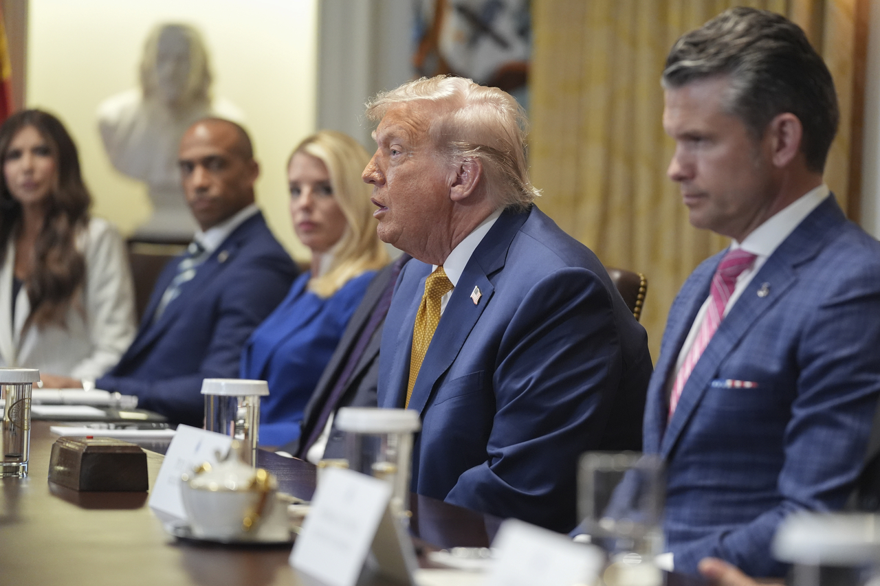 US President Donald Trump (center) speaks during a Cabinet meeting at the White House, Tuesday, in Washington. (AP-Yonhap)