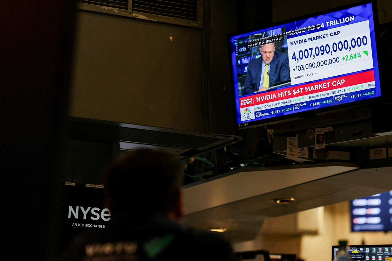 A screen displays news on "Nvidia hits $4tr market cap" on the floor at the New York Stock Exchange in New York City on Wednesday.   Reuters-Yonhap