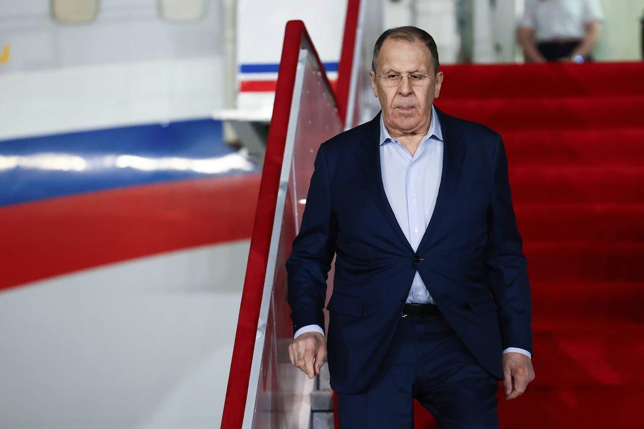 In this photo released by Russian Foreign Ministry Press Service, Russian Foreign Minister Sergey Lavrov steps down from the plane upon his arrival at an International airport outside Pyongyang, North Korea, on Friday . (AP)