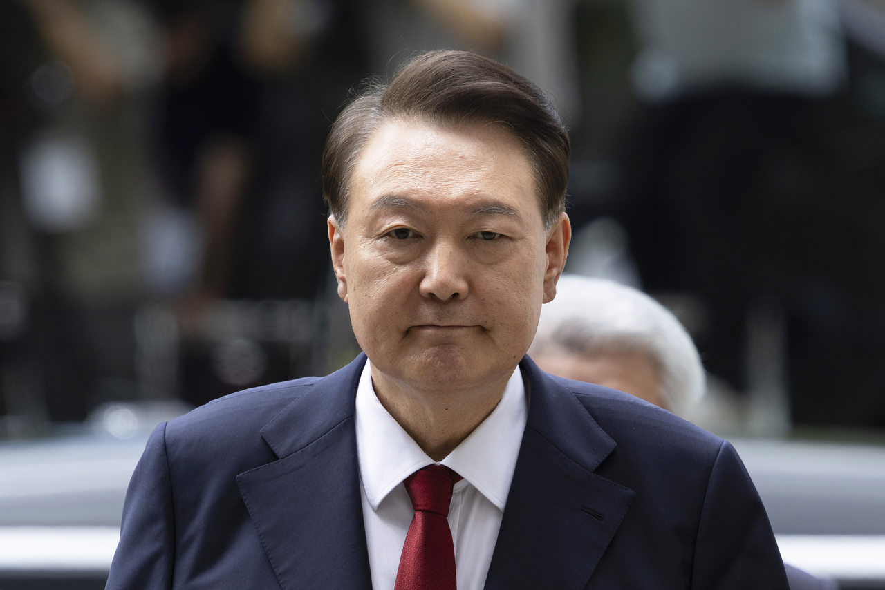 Former President Yoon Suk Yeol appears at the Seoul Central District Court in the capital city on Wednesday, to attend a hearing to review the legality of his detention over charges related to his failed attempt to impose martial law. (Yonhap)