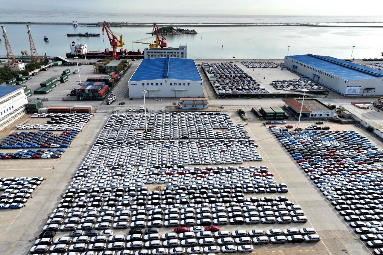 Chinese-made cars parked at a port in Lianyungang, in China's eastern Jiangsu province on Tuesday   AFP-Yonhap