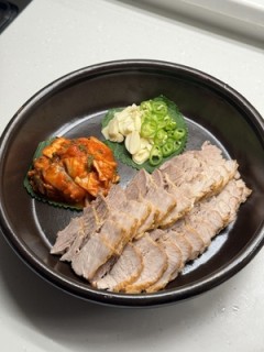 Bossam (boiled pork wraps)