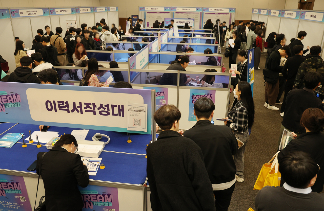 This file photo, taken March 28, 2025, shows young job seekers attending a recruitment fair in Busan, located about 320 kilometers southeast of Seoul. (Yonhap)