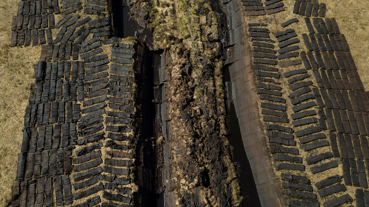 A drone view shows turf from Derryrush bog left out to dry after being harvested from the blanket bog in Derryrush, Ireland, April 22, 2024.   Reuters-Yonhap