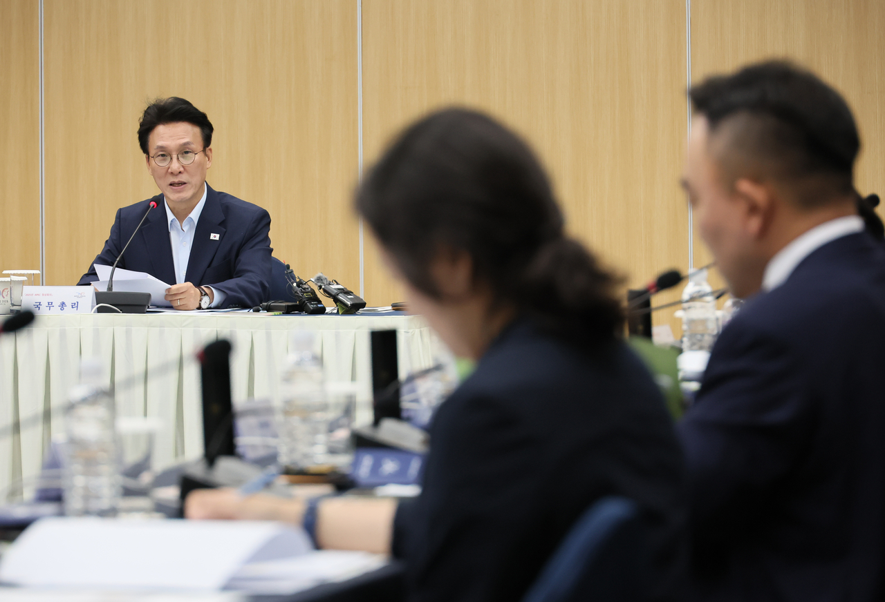 Prime Minister Kim Min-seok attends a meeting at the HICO convention center in Gyeongju, North Gyeongsang Province, Friday, to receive a report on the country's preparations for this year's Asia-Pacific Economic Cooperation forum summit that is set to take place in the city in November. (Yonhap)