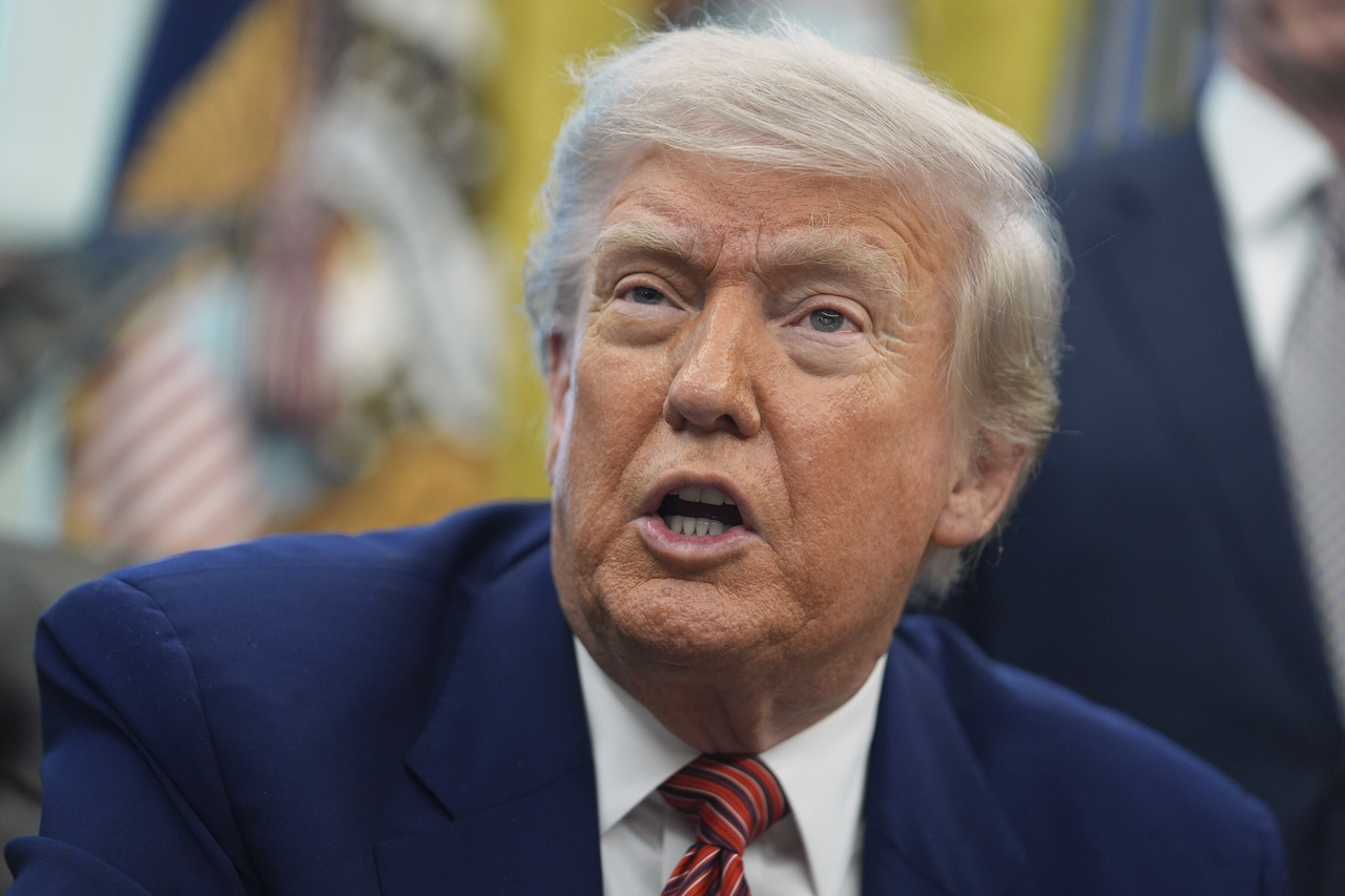 In this file phto, US President Donald Trump speaks to reporters in the Oval Office of the White House on May 23 this year. (AP-Yonhap)