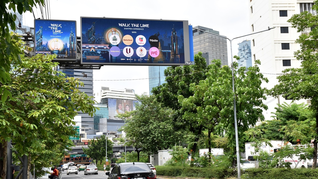 Oversized outdoor ads promoting Enhypen's concert in Bangkok, Saturday. (Belift Lab)