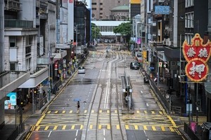 Typhoon Wipha topples trees and causes major flight disruptions in Hong Kong and southern China