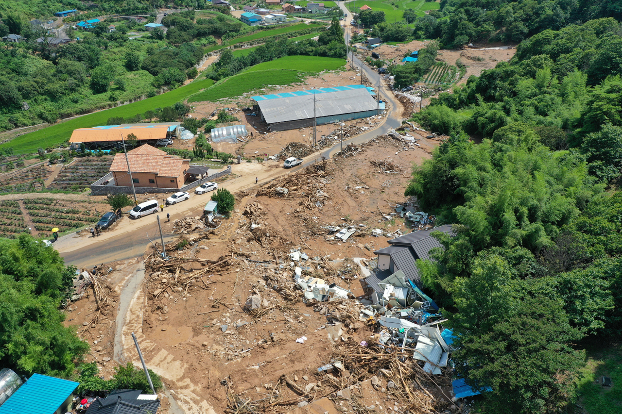 A village in Sancheong-gun, South Gyeongsang Province, is left destroyed after a landslide hit the village due to record-breaking heavy rainfall on Sunday. (Yonhap)