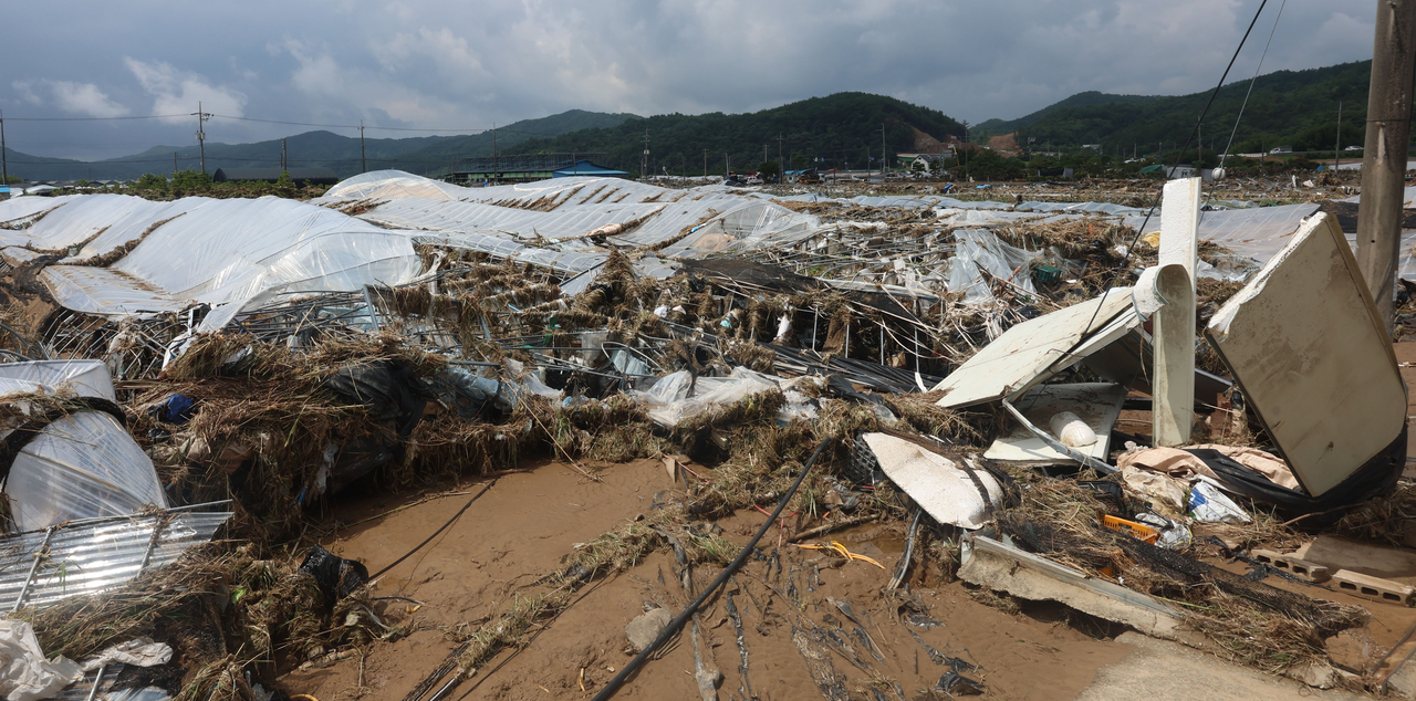 Greenhouses in Sancheong, South Gyeongsang Province, destroyed by the recent heavy rain are seen in this photo taken on Monday. (Yonhap)