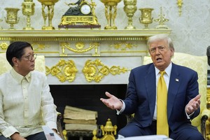 Trump says China trip is 'not too distant' as trade tensions ease