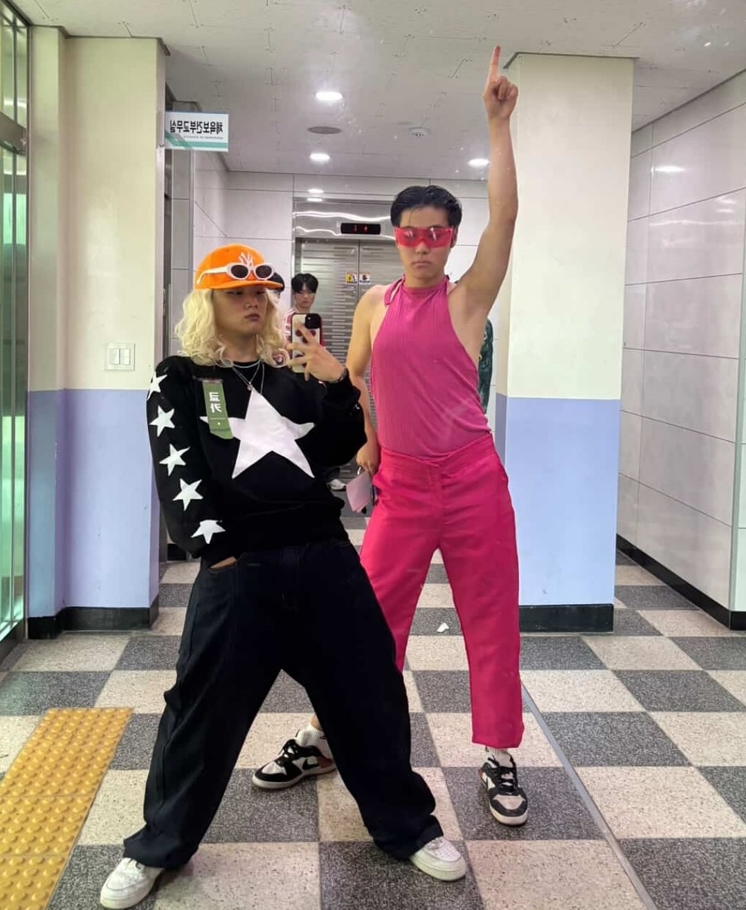 A student (left) dressed as dancer Kyoka from 'Street Woman Fighter,' and another as singer and producer Park Jin-young at the 2025 Waterbomb Music Festival. (Instagram)