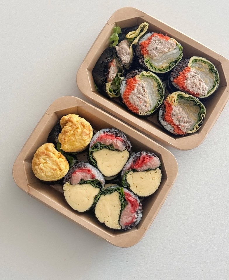 Flying fish roe, aged kimchi & tuna kimbap (top), and the Mentaiko egg kimbap (bottom) from Botanic Garden Kimbap (Instagram)