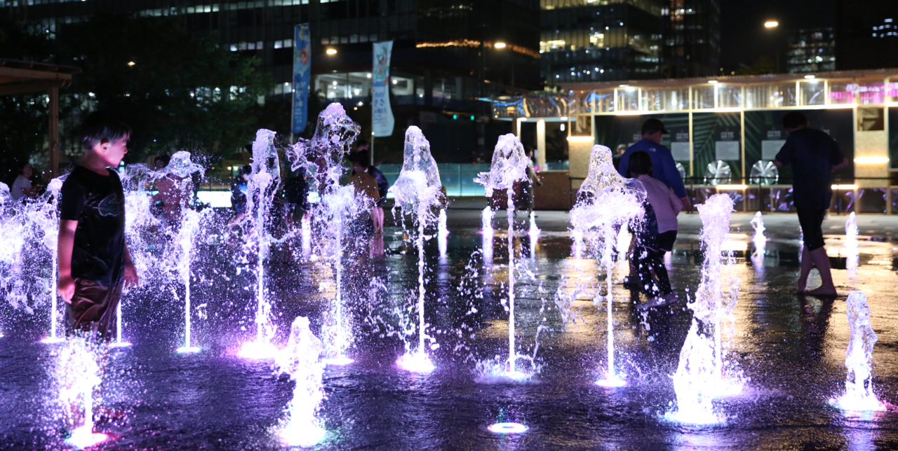 A child cools off in a fountain at Gwanghwamun Square in Jongno-gu, Seoul (Seoul Metropolitan Government)