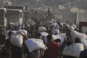 Israel air drops aid packages into Gaza