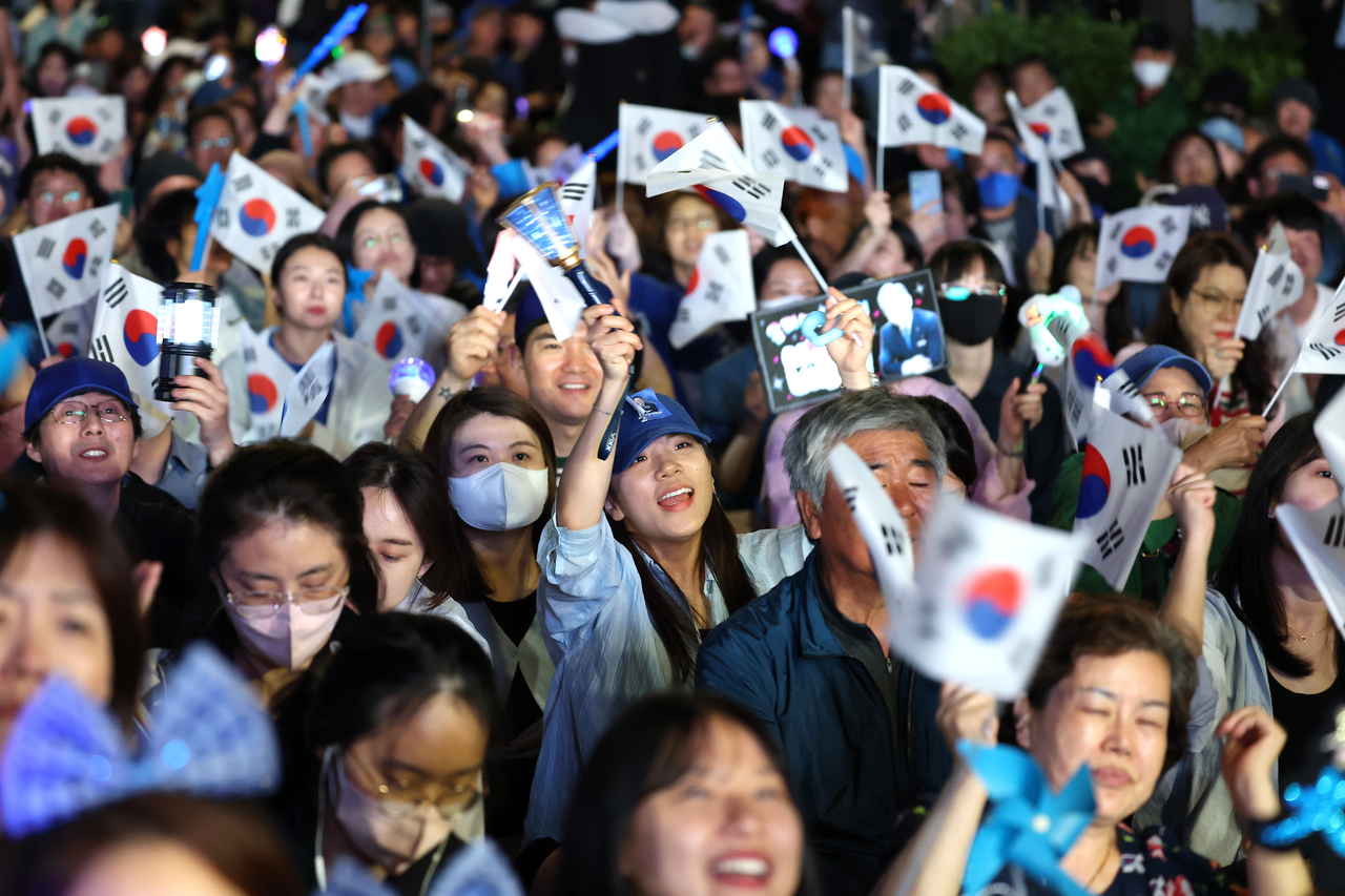 Supporters of then-presidential candidate Lee Jae Myung of the Democratic Party celebrate during an Election Day rally in front of the National Assembly on June 3, 2025, in Seoul. (Getty Images)