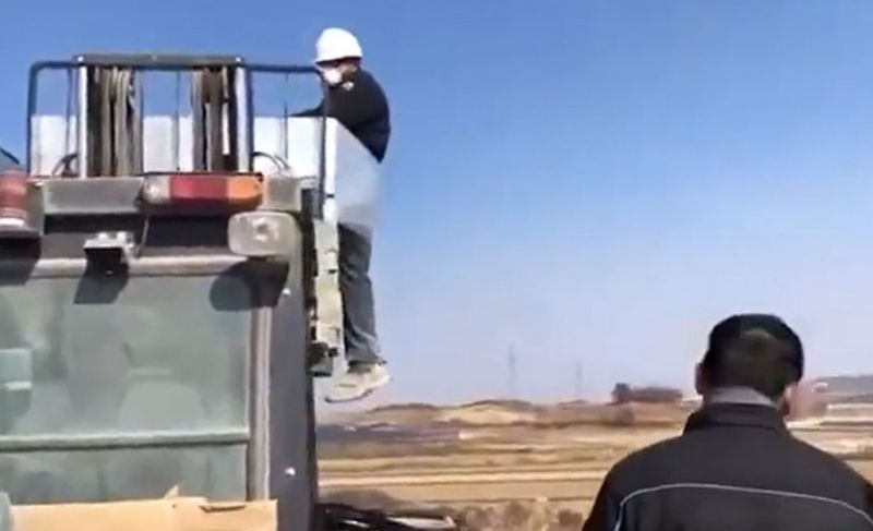 This image from a migrant worker’s human rights network based in South Jeolla Province shows the Sri Lankan migrant worker tied to a forklift
