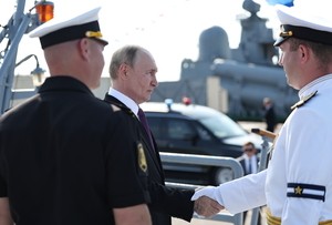 Russia scales down celebrations honoring its navy as Ukraine launches more drone attacks