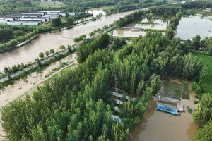 Heavy rains and flooding kill at least 34 people in and near Beijing