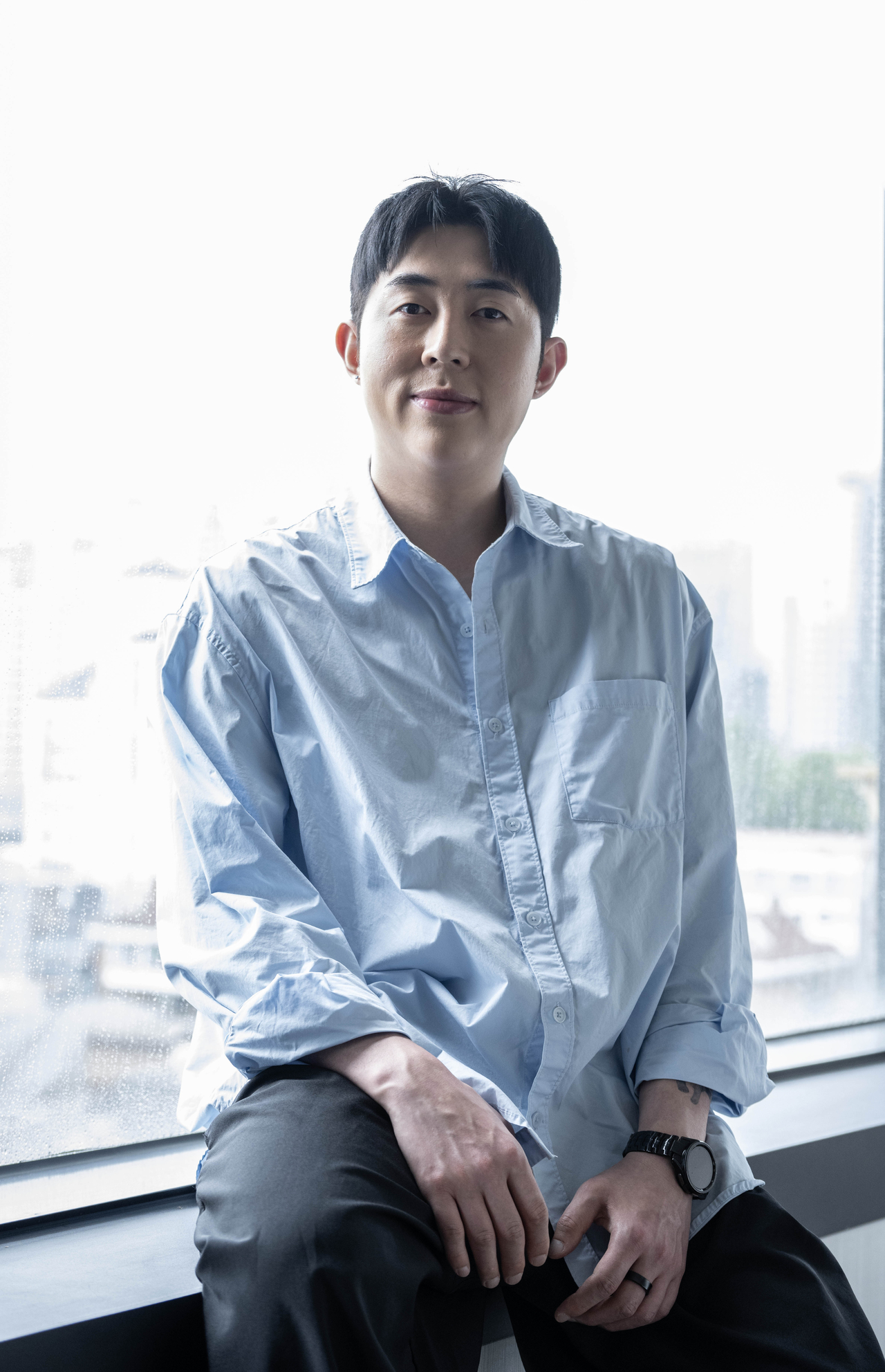 Wedding planner Han Ga-ram, who offers wedding services for LGBTQ+ couples, poses for a photo ahead of an interview with The Korea Herald at a photo studio in Seocho-gu, Seoul, July 17. (Im Se-jun/The Korea Herald)