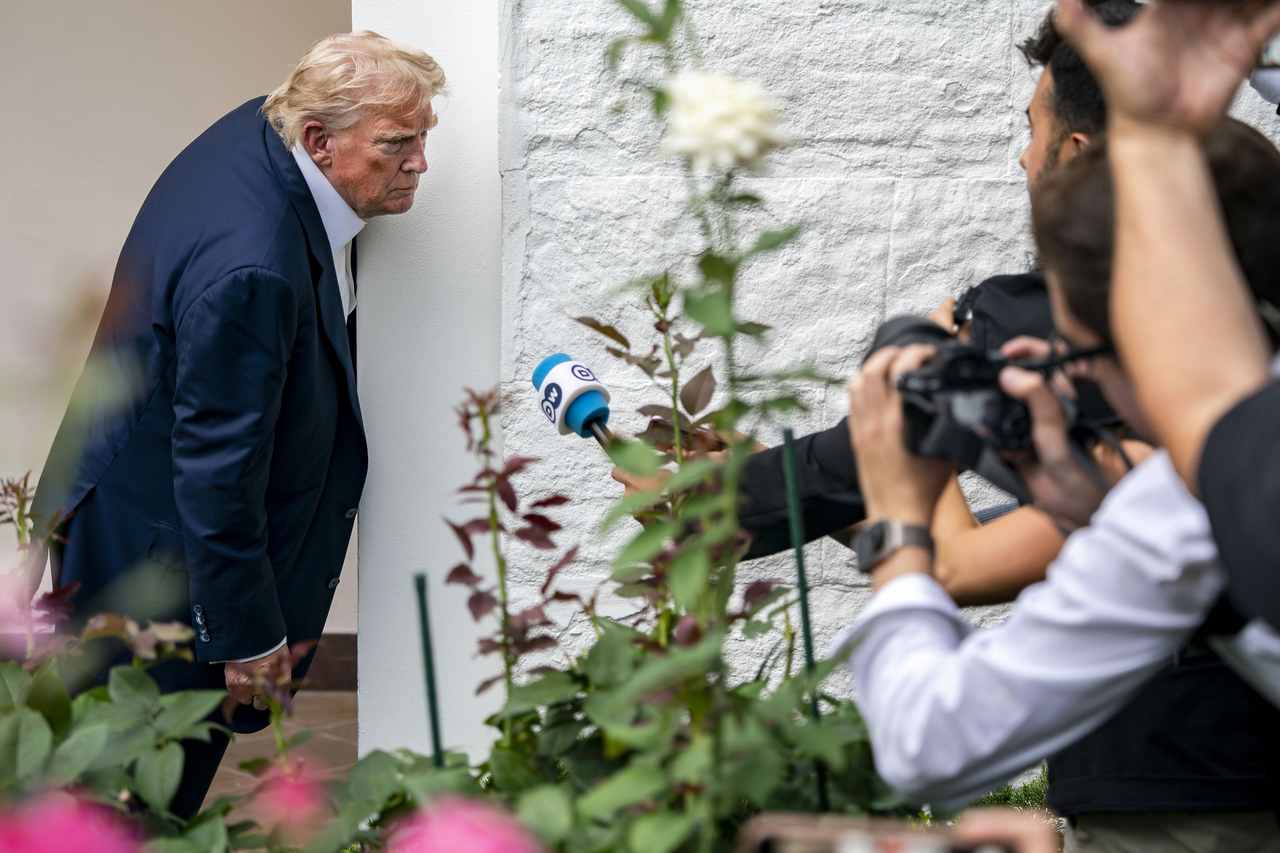 President Donald Trump stops to speak to reporters near the Rose Garden of the White House in Washington, DC on Tuesday. (UPI via Yonhap)