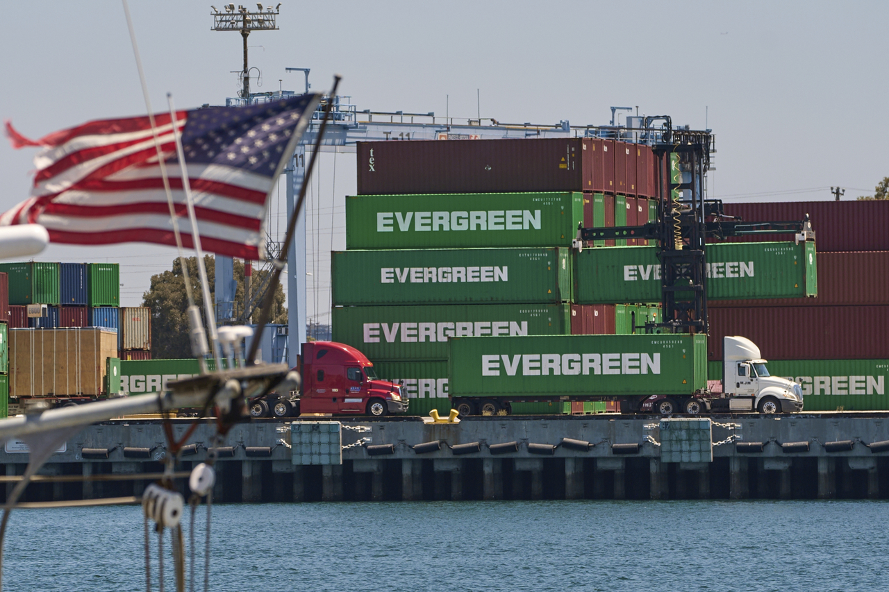 Shipping containers sit stacked at the Evergreen terminal at the port of Los Angeles on Friday.   AP-Yonhap