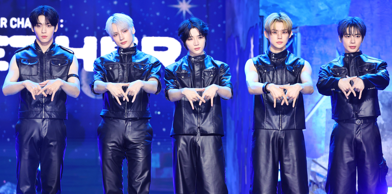 Boy group Tomorrow X Together poses for a photo during a media showcase at the Peace Hall of Kyung Hee University in Seoul on July 21, 2025. (Yonhap)