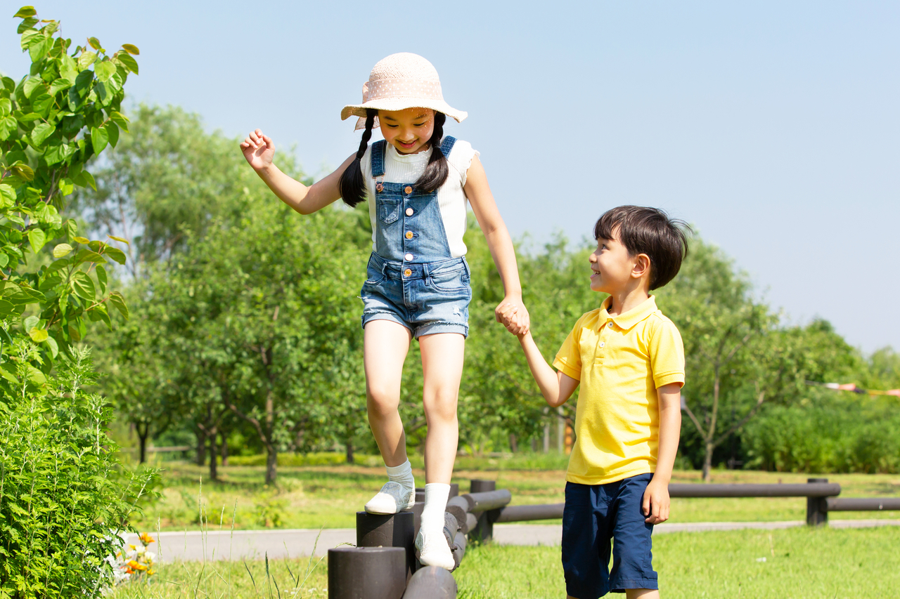 A boy and a girl hold hands. This image is unrelated to the story. (Getty Image)
