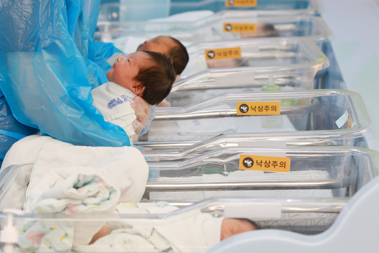 In this unrelated photo, nurses take care of newborn babies at a hospital on July 24. (Yonhap)