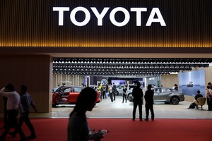 Toyota reports a 37% drop in profit, cuts its forecast due to Trump's tariffs
