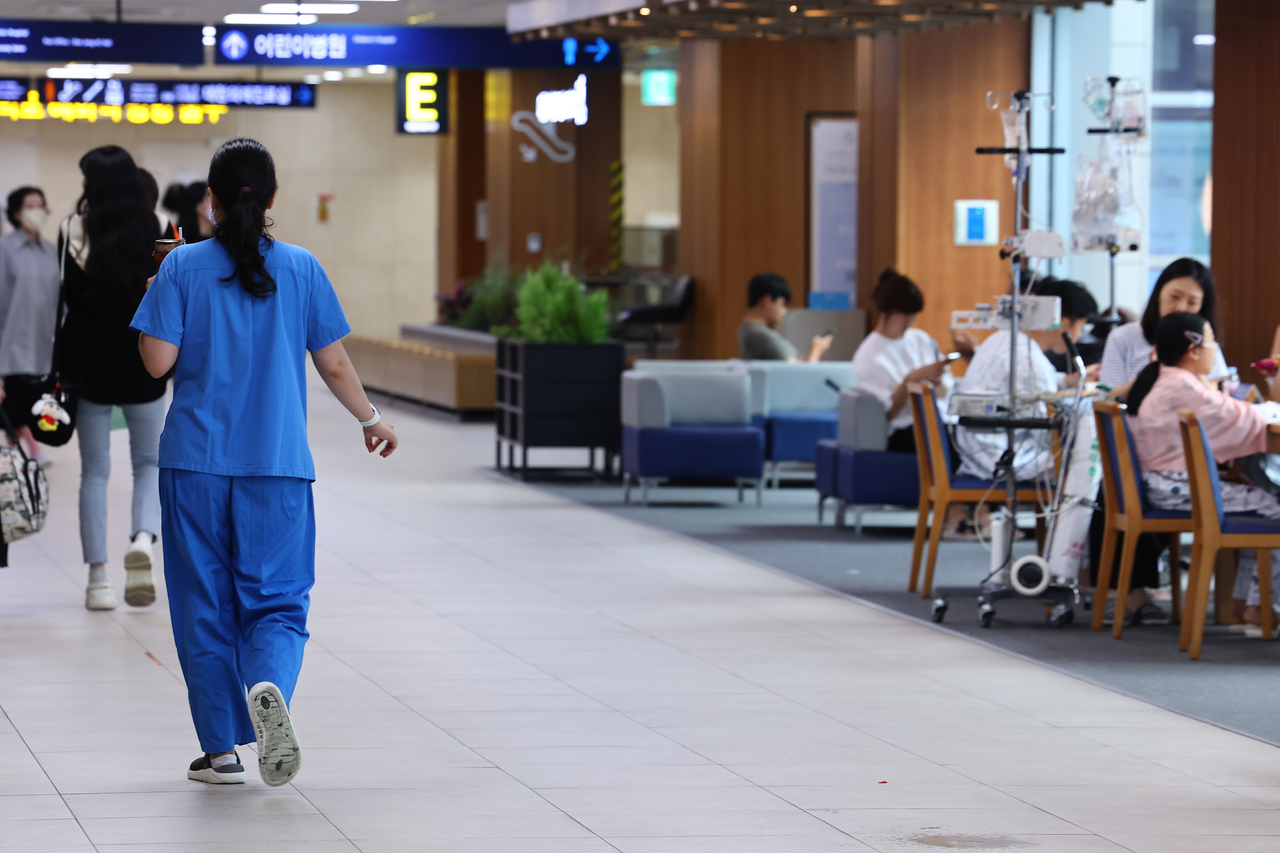 A medical official walks at one of the major hostpitals in Seoul on July 20. (Yonhap)
