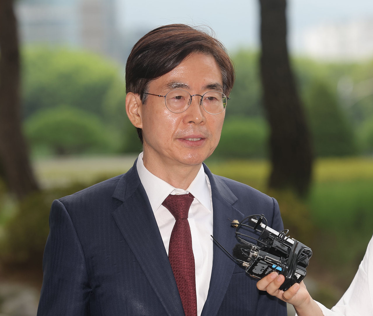Rep. Cho Kyoung-tae of the main opposition People Power Party arrives at special counsel Cho Eun-suk's office in southern Seoul on Monday, to be questioned about former President Yoon Suk Yeol's brief imposition of martial law in December. (Yonhap)