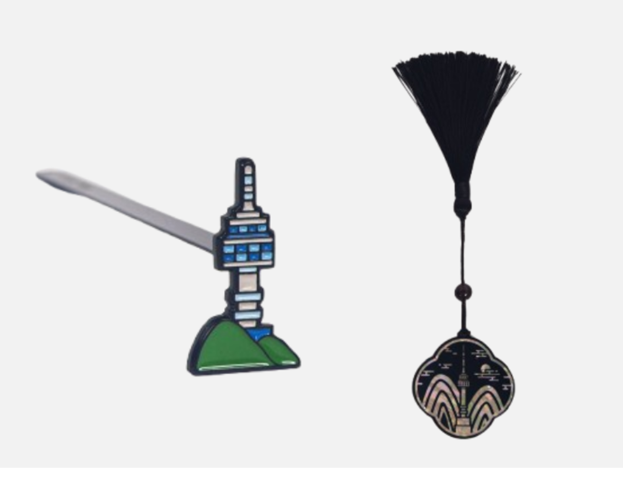 The N Seoul Tower-themed metal bookmark (left) and mother-in-pearl bookmark (Seoul Tourism Organization)