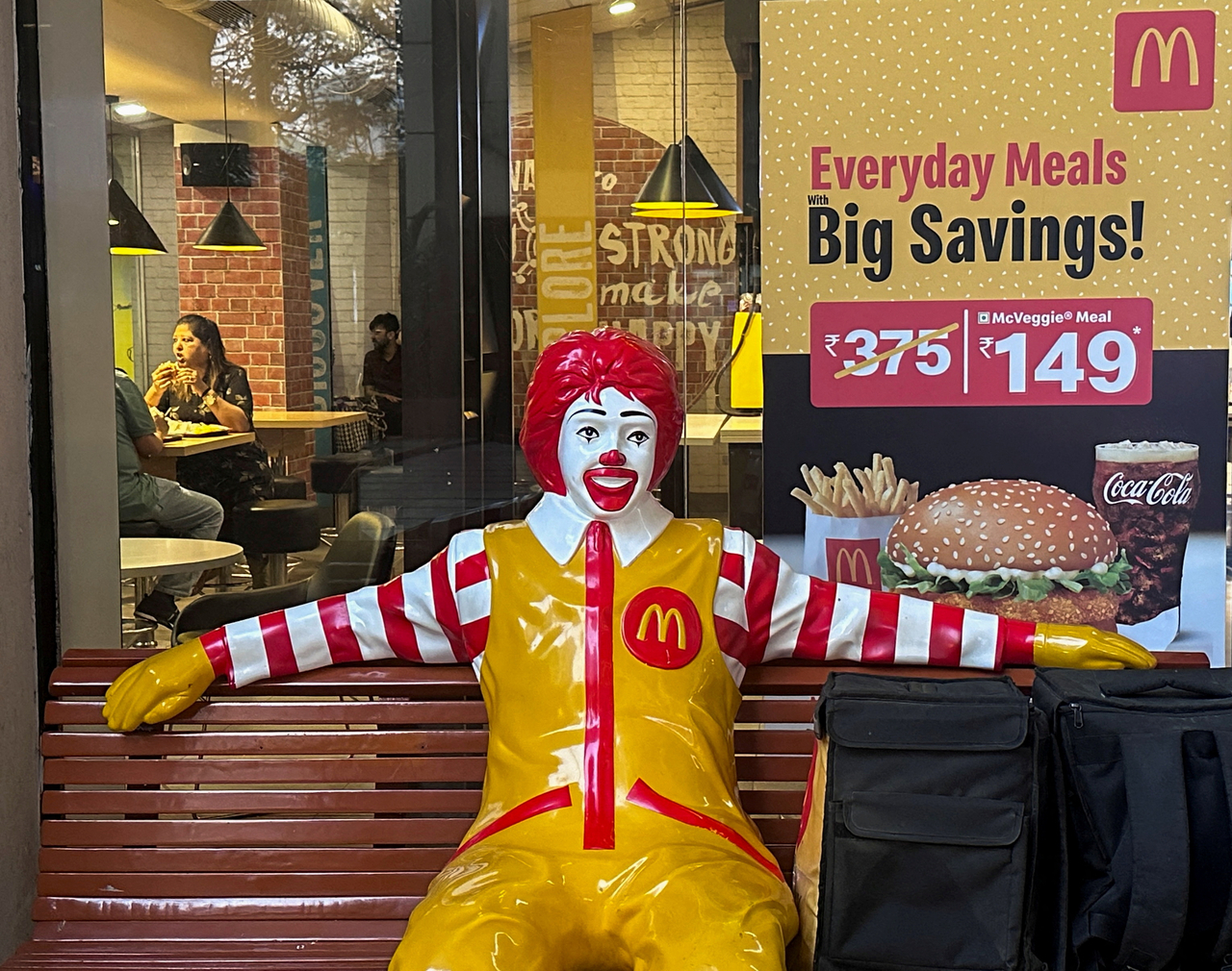 A statue of Ronald McDonald, a mascot of the McDonald's fast-food restaurant chain is seen outside the restaurant in Mumbai, India, Feb. 26, 2024.   Reuters-Yonhap