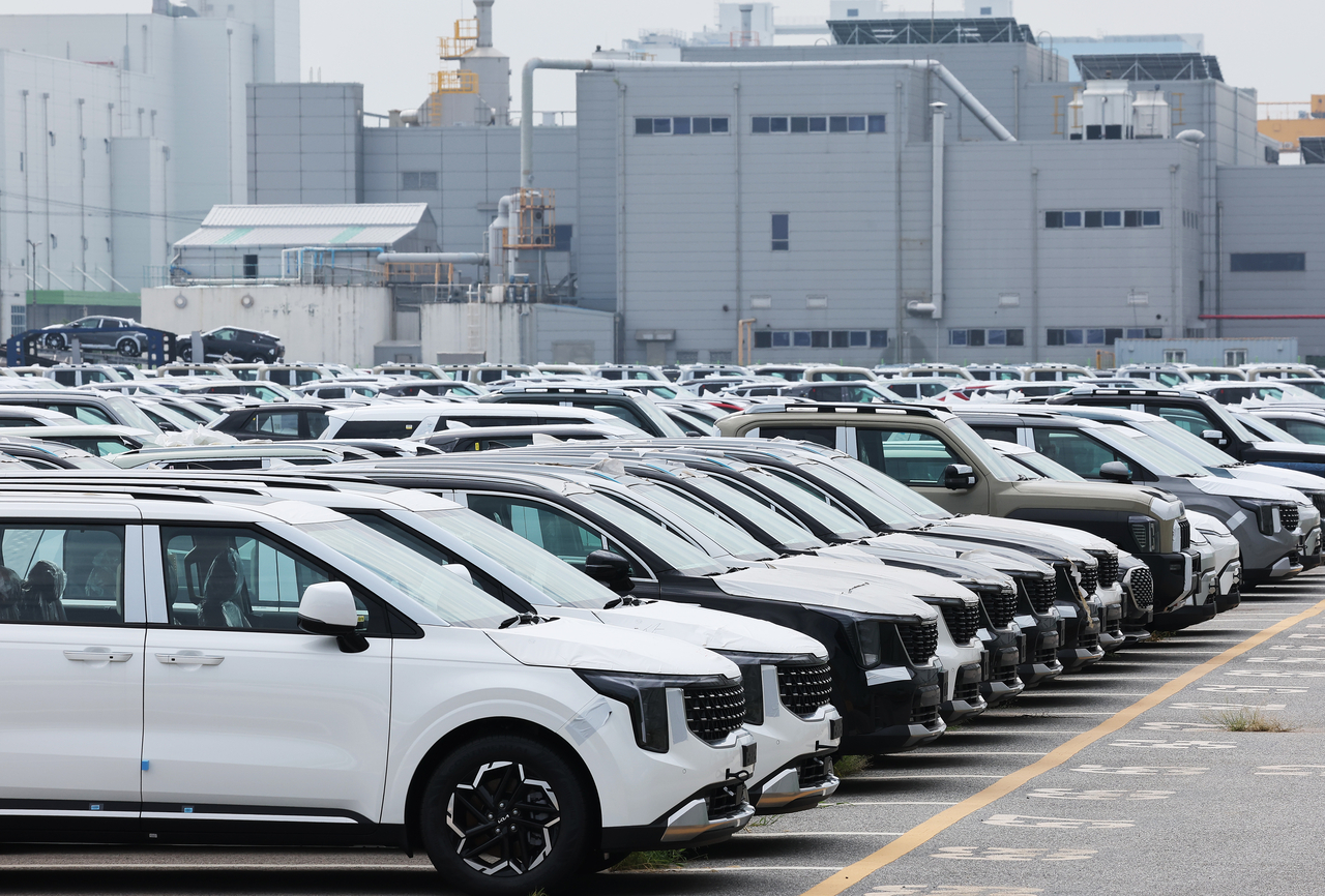 Cars wait to be exported at a port in Pyeongtaek, about 60 kilometers south of Seoul, on Aug. 7, 2025. (Yonhap)