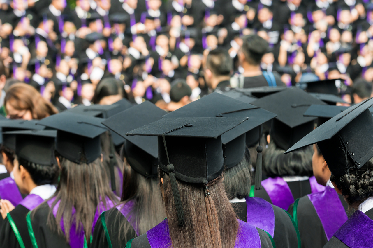 Graduates are seen during commencement at university.    123rf
