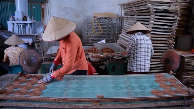 Women make incense coils in Phuong Duc Commune.   (Viet Nam News)