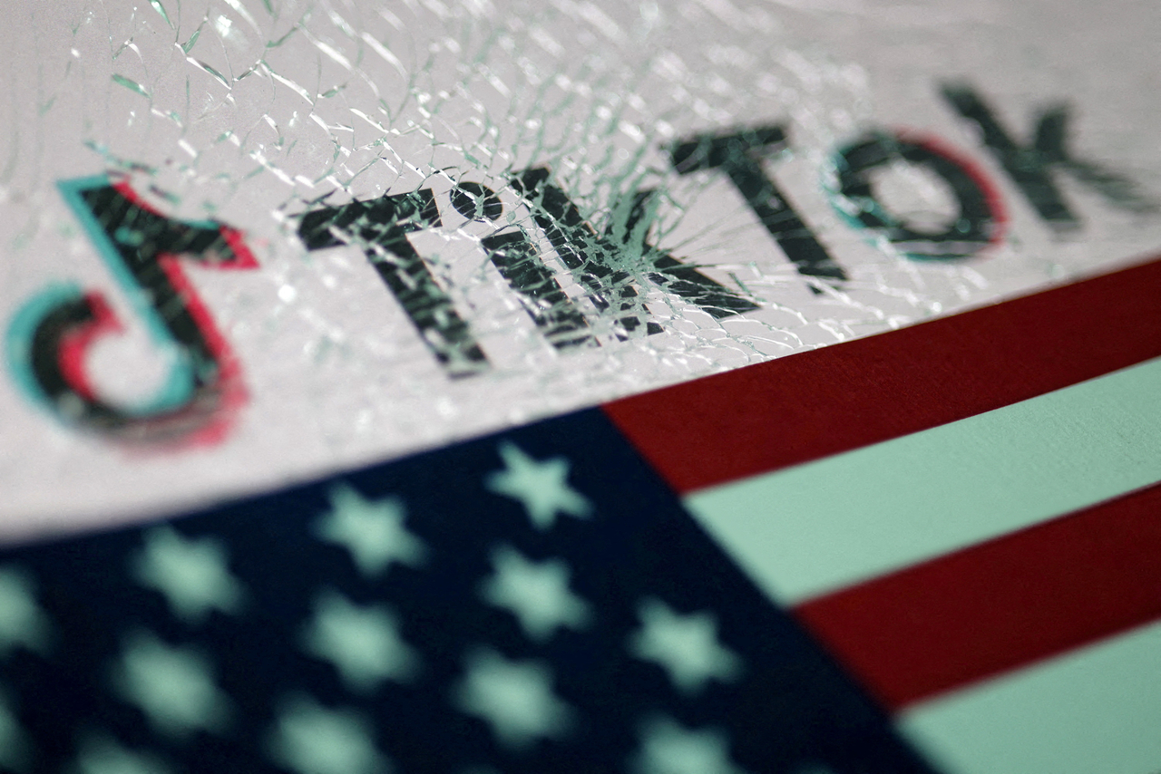 The US.flag and the TikTok logo seen in this illustration taken Jan. 16.   Reuters-Yonhap