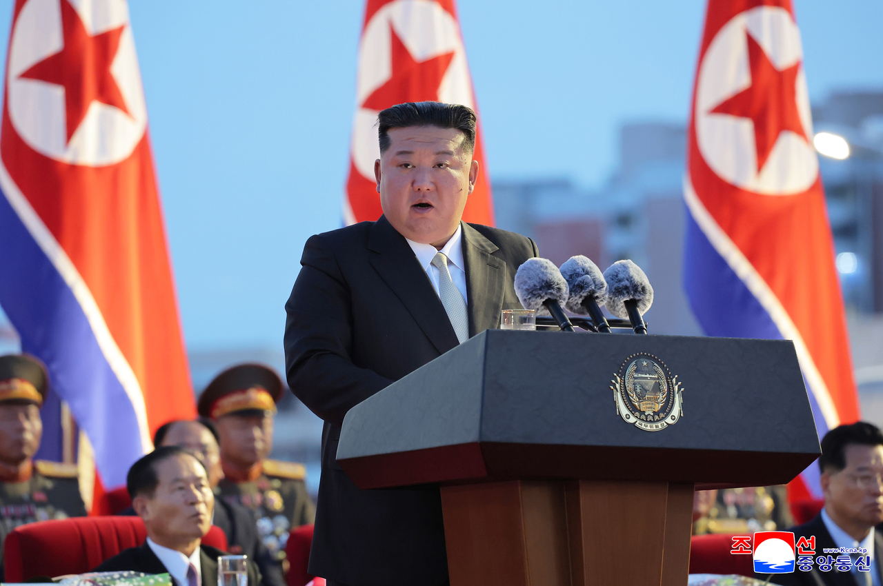 This photo, carried by North Korea's official Korean Central News Agency on Aug. 15, shows North Korean leader Kim Jong-un delivering a speech marking the 80th anniversary of Liberation Day the previous day. (Yonhap)