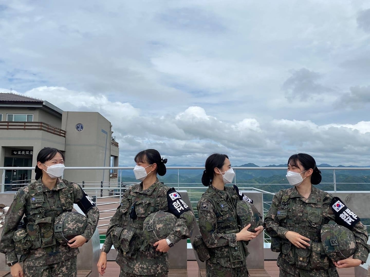 Female troops of the South Korean Army stand together during frontline duty at a guard post near the inter-Korean border in September 2021, commemorating the 71st anniversary of women’s service in the military. (Republic of Korea Army)
